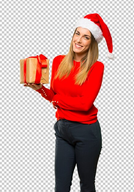 ブロンドの女性はクリスマス休暇のために服を着た