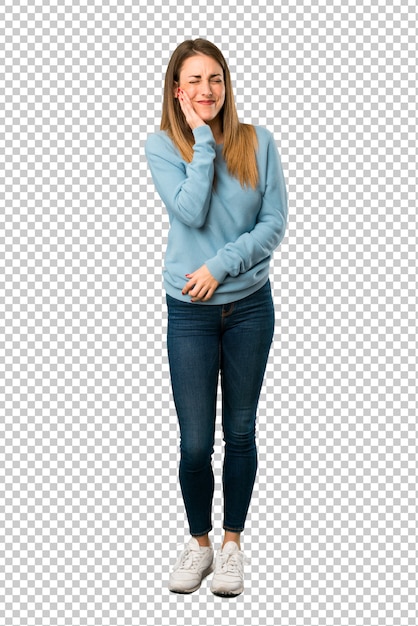 Blonde woman with blue shirt with toothache