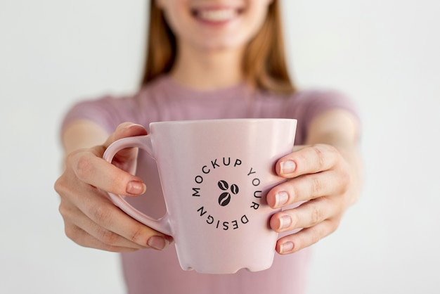 Blonde woman with coffee mug mock-up