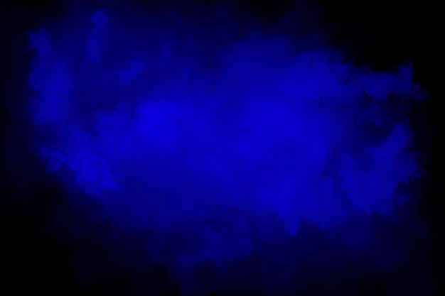 blue color powder explosion on black background colored cloud blue colorful dust explode