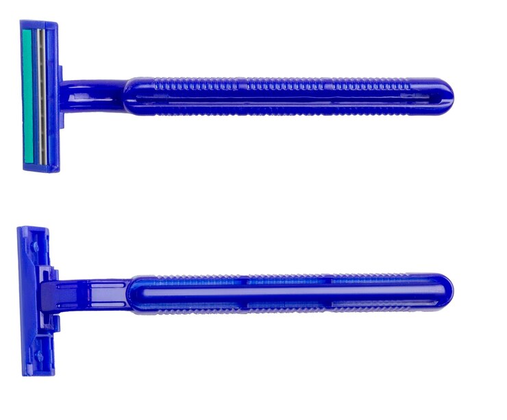 PSD blue disposable razor on empty background