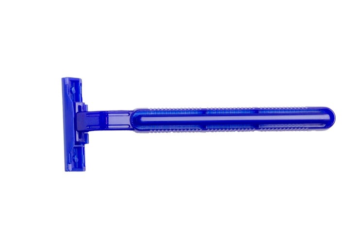 PSD blue disposable razor on empty background