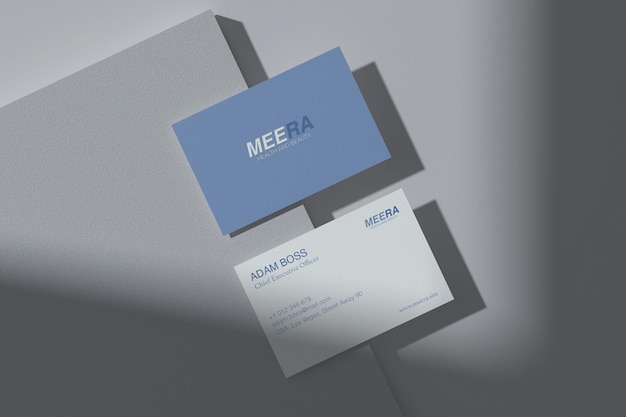 A blue and white business card for mear.