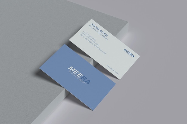 A blue and white business card for meenaia.