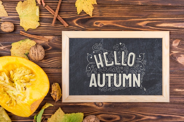 Board with chalk message for autumn season