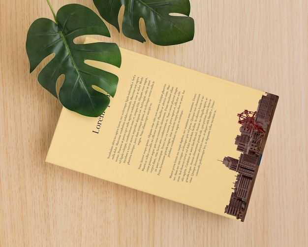 Book cover arrangement with leaves