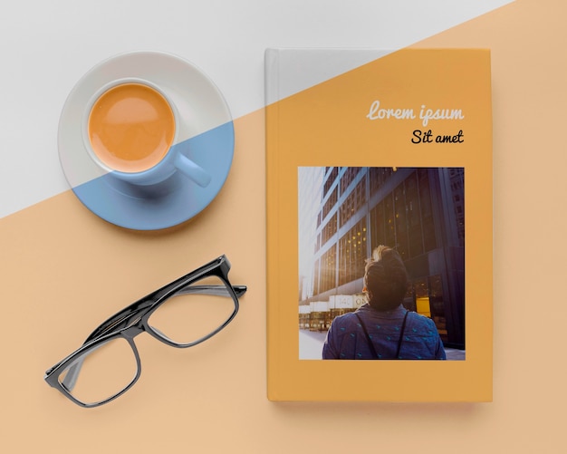 PSD book cover mock-up assortment with cup of coffee and glasses