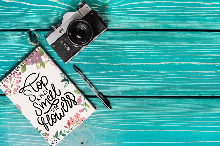 PSD book cover mockup with camera and copyspace