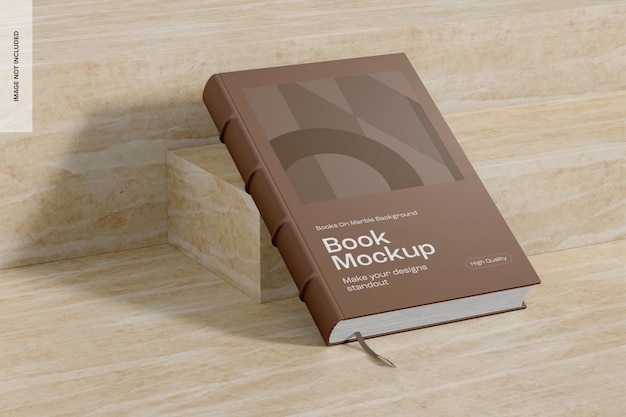 Libro su mockup di sfondo in marmo, leaned