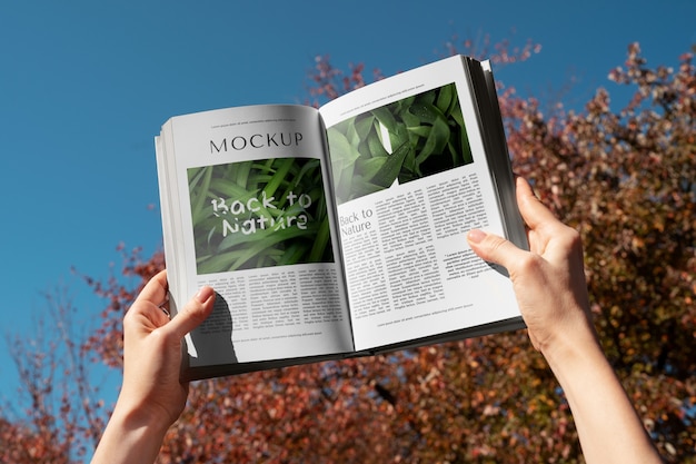 PSD book mockup in nature