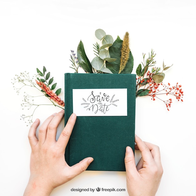 PSD book mockup with hands