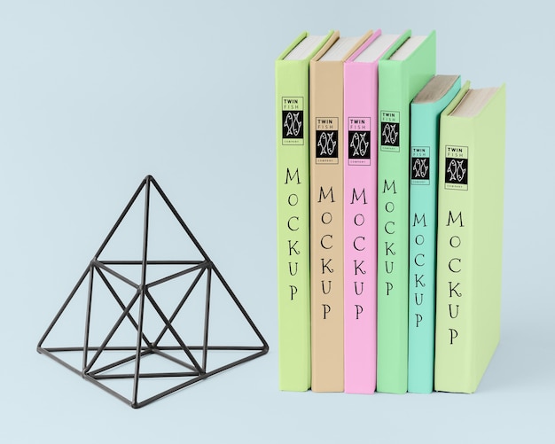 Books arrangement with pyramid figure