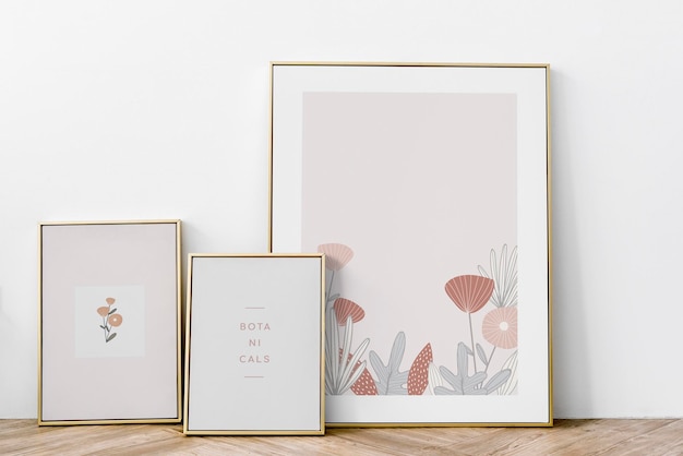 Botanical golden frame mockup against a wall