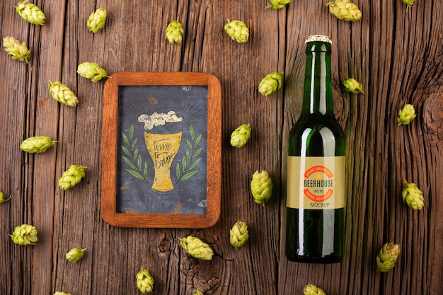 Bottle of beer with sign along on table