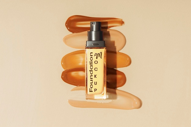 A bottle of foundation perfume sits on a beige background.