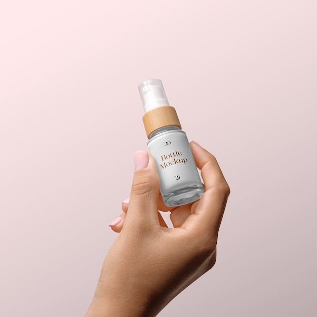 bottle with woman hand mockup