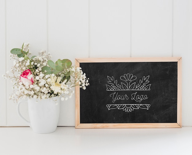 PSD bouquet of flowers and chalkboard mock-up