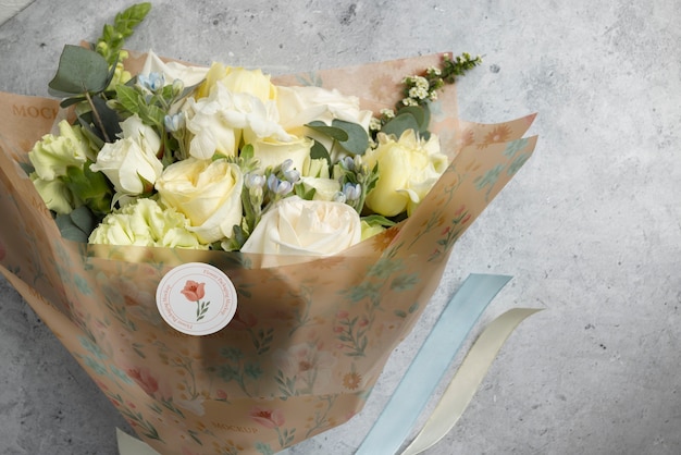 PSD bouquet of flowers with paper cone packaging