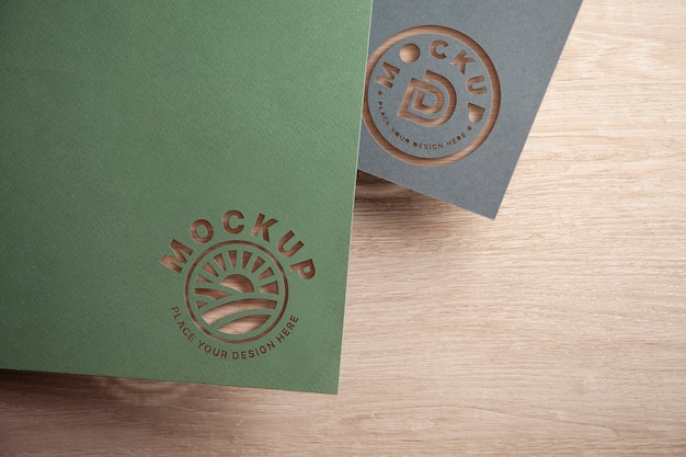 PSD bovenaanzicht papier uitgesneden logo mockup