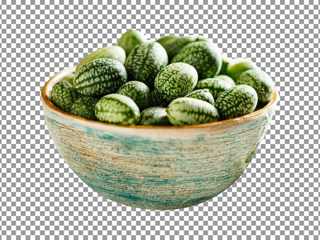 A bowl of cuca melons with green leaves on transparent background