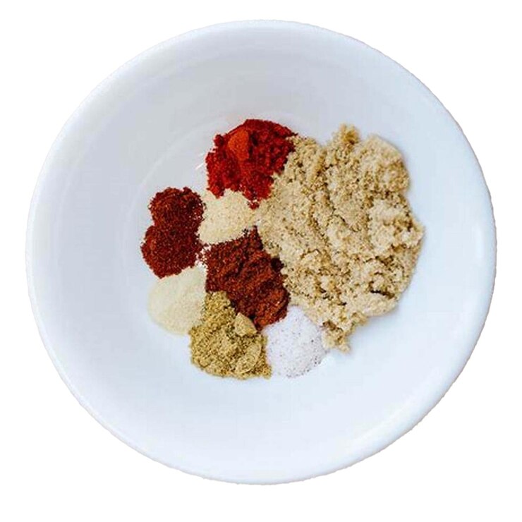 PSD a bowl of different spices with one that says spice