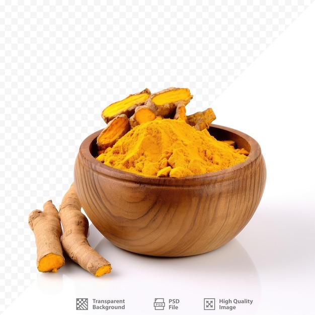 PSD a bowl of orange turmeric is in a wooden bowl.