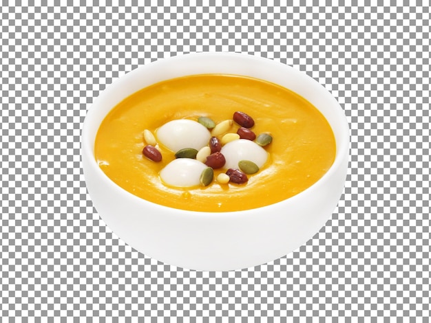 A bowl of pumpkin soup with white seeds and nuts on transparent background