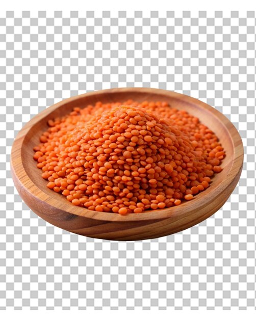 Bowl of raw lentils and spoon on cutting board