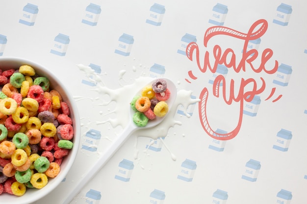 Ciotola e cucchiaio con cereali mock-up