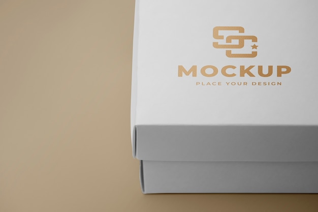 PSD scatole con mockup logo dorato