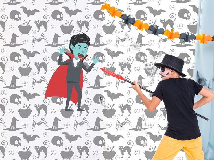 PSD boy fighting with painted vampire on the wall halloween party