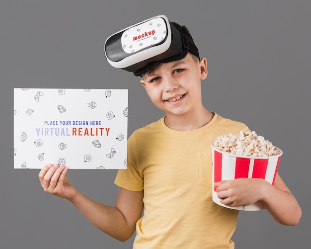 PSD boy wearing virtual reality headset with card mock-up