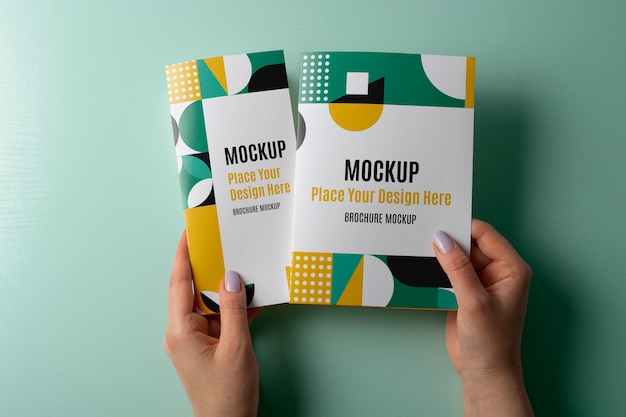 brochure mockup design held in hand