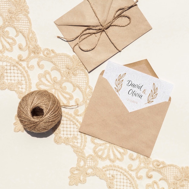 PSD brown paper envelopes on embroidery fabric