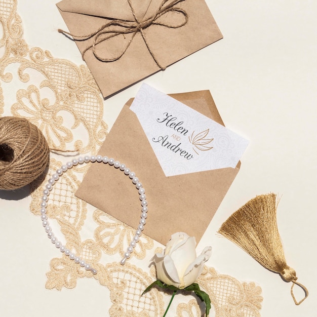 PSD brown paper envelopes with flowers and pearls