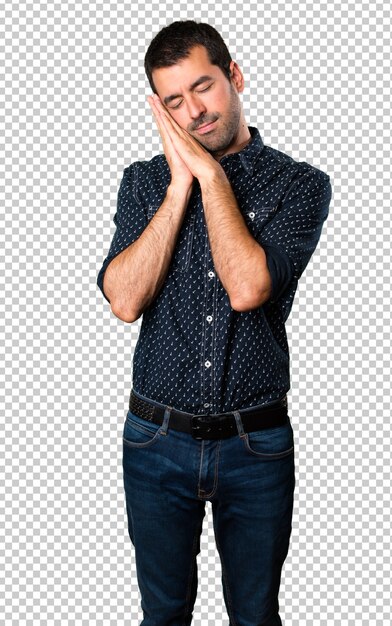 Brunette man making sleep gesture