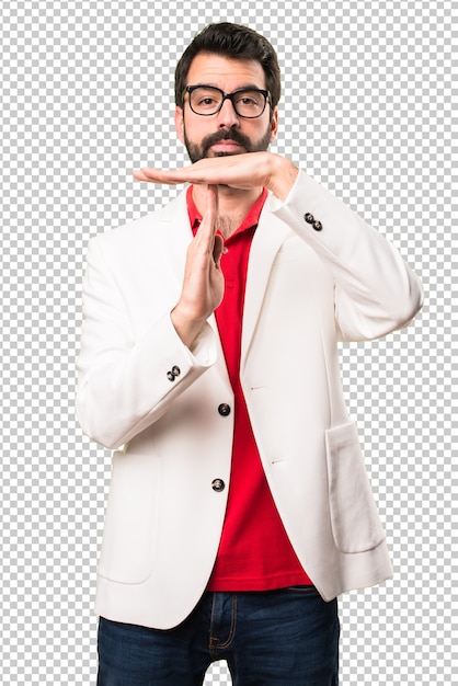 Brunette man with glasses making time out gesture