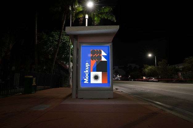 Bus stop mock-up at night in the city