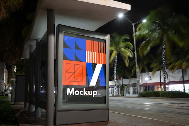 Bus stop mock-up at night in the city