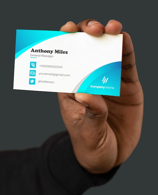 Business card in hand