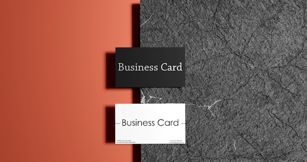 PSD business card mock ups on black marble background.