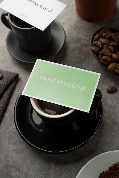 PSD business card mockup design with coffee