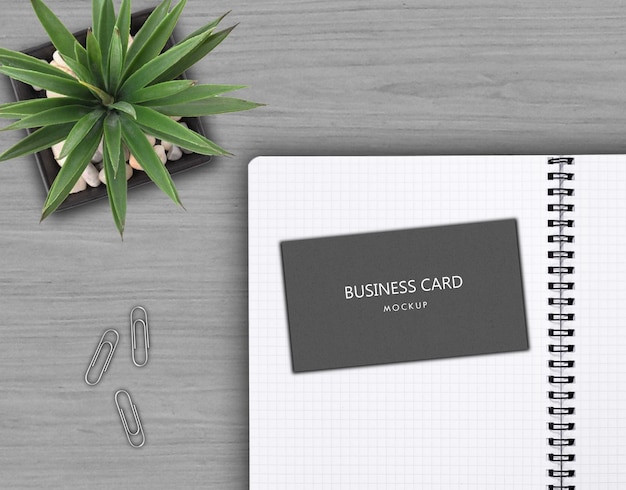 Business card mockup on the gray desktop