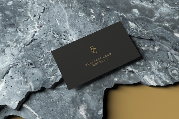 PSD business card mockup on marble stones