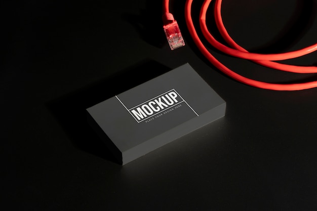 Business card mockup near wires