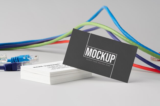 PSD business card mockup near wires