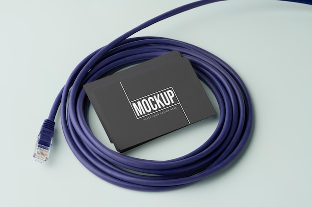 PSD business card mockup near wires