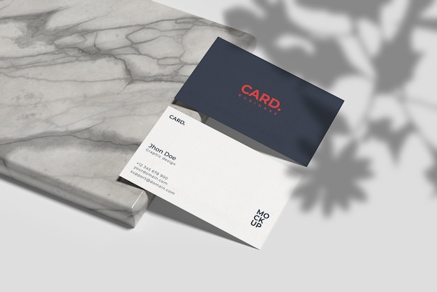 PSD business card mockup on side marble with shadow overlay