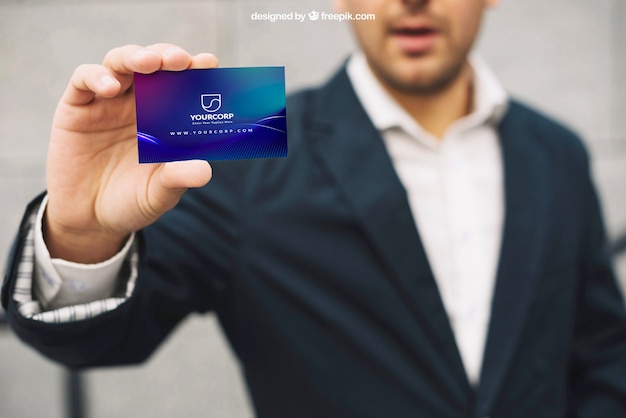 PSD business card mockup with businessman