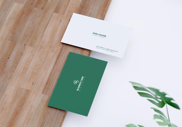 Business card mockup with foliage design